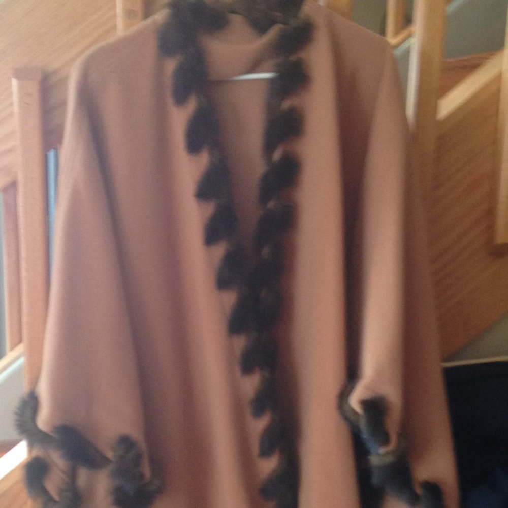 Cape with faux fur trim